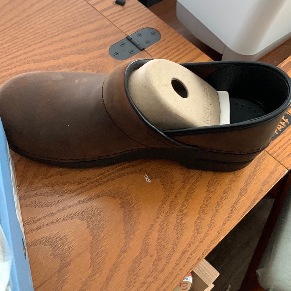Brand new. Never worn before Dansko Women’s shoes 40W